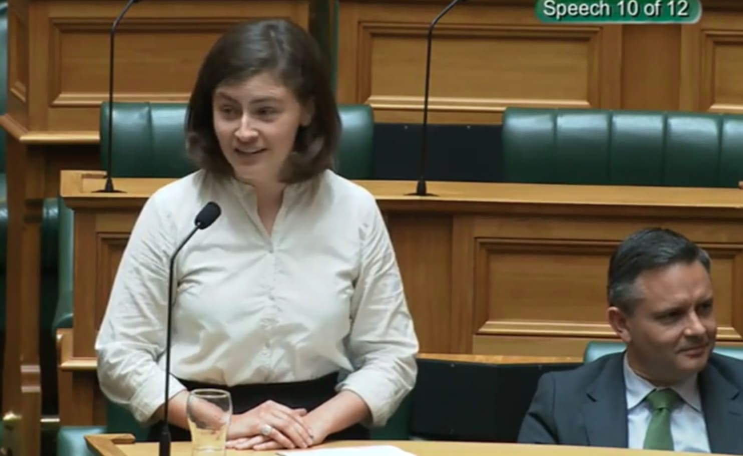 Green MP Chlöe Swarbrick speaking in parliament and responding to heckling with 'okay, Boomer'.
