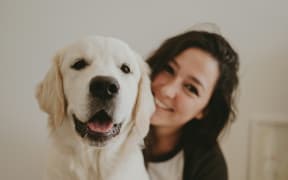 Woman with her dog.