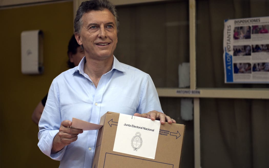 Buenos Aires Mayor and presidential candidate for "Cambiemos" party Mauricio Macri prepares to cast his vote in Buenos Aires.