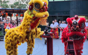 Hundreds of people gathered at the Auckland Sky Tower on 22 January, 2023, to watch the lion dance, cultural performances, and calligraphy demonstrations in celebration of the Lunar New Year.