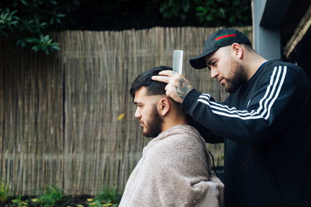 Barber Quinten, who goes by Q.