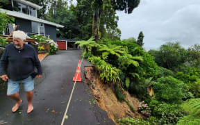 This man's driveway slipped onto Ototori Bay Road, Titirangi last night.