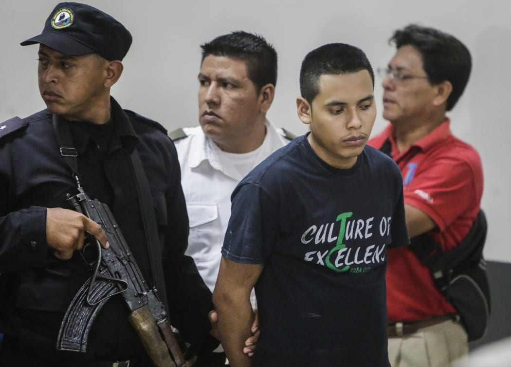 Evangelical pastor Juan Rocha arrives in court under escort to be sentenced to 30 years of imprisonment for the abduction and murder of Vilma Trujillo