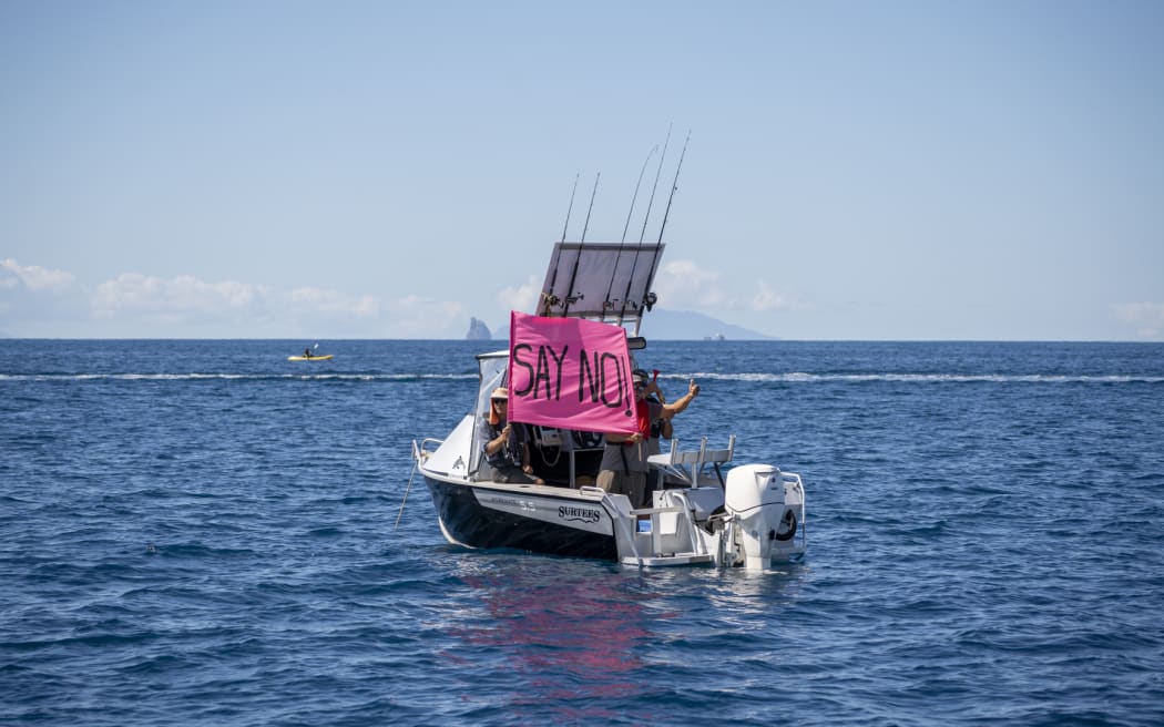 A flotilla of more than 50 watercraft converged from Whangārei Heads to Langs Beach to oppose the proposal to dredge nearly 8.5 million cubic meters of sand over the next 35 years.