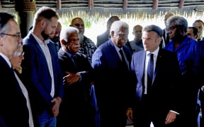 New Caledonia's Goverment President Louis Mapou (3rd L) and New Caledonia's Congress President Roch Wamytan (C) attend a meeting with French President Emmanuel Macron (2nd R), New Caledonia's elected officials and local representatives at the French High Commissioner Louis Le Franc's residence in Noumea, France's Pacific territory of New Caledonia on May 23, 2024. Macron flew to France's Pacific territory of New Caledonia on a politically risky visit aiming to defuse a crisis after nine days of riots that have killed six people and injured hundreds. Macron's sudden decision to fly to the southwest Pacific archipelago, some 17,000 kilometres (10,500 miles) from mainland France, is a sign of the gravity with which the government views the pro-separatist violence. (Photo by Ludovic MARIN / POOL / AFP)