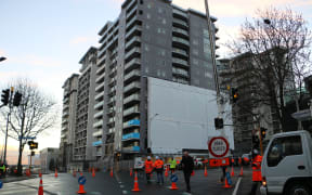 The building on the corner of Nelson St and Victoria St, which lost a panel, closing Victoria Street.