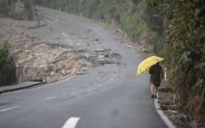 Road washed out just north of Punakaiki rocks. 500m stretch of road and footpath was damaged by king tides during the storm.