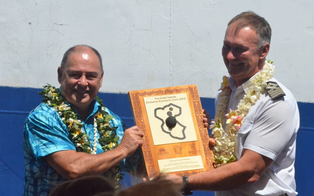 Prime Minister Mark Brown presents a plaque of appreciation to a United States research vessel E/V Nautilus official during a welcome ceremony at Avatiu Wharf, celebrating a new era of ocean exploration and scientific partnership in the Cook Islands. TALAIA MIKA