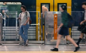 Auckland trains, station, on train, commute, commuters, platform, out of service, passengers, public transport