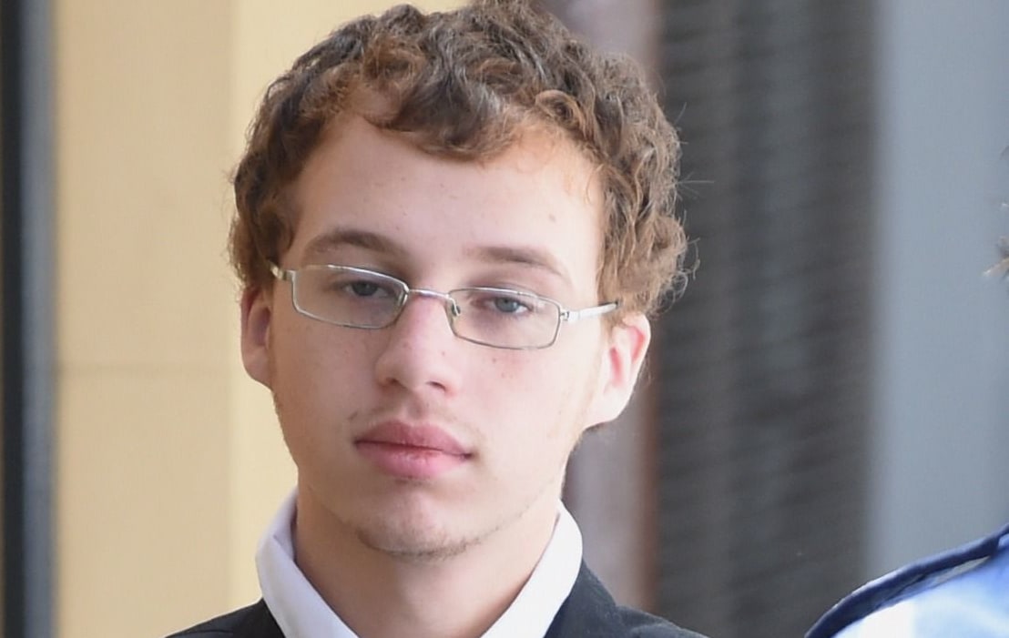 Daniel Kelsall is escorted to a prison transport vehicle at the NSW Supreme Court in Sydney, Wednesday, March 18, 2015. Kelsall, a 21-year-old cleaner, has been found guilty of murder and indecent assault in the stabbing death of Morgan Huxley, at his unit in Sydney's north on September 8, 2013.