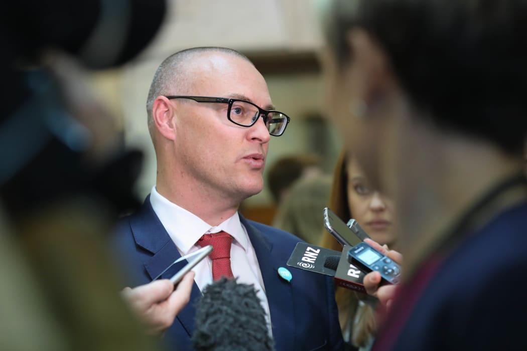 Minister of Health David Clark talking with journalists