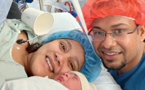 Shradda and Gaurav Patil with their son Aarav.