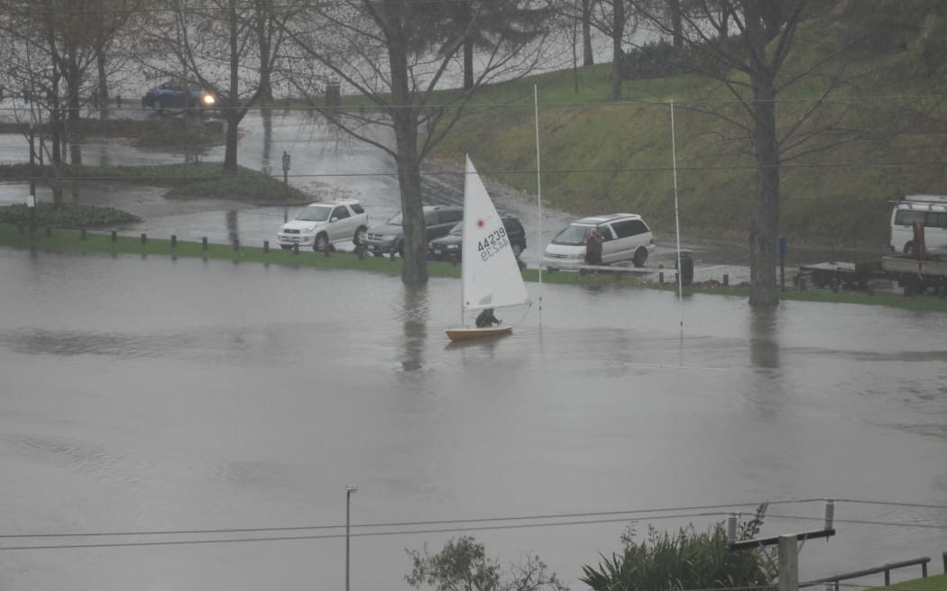 Boating on what is usually a rugby field in Greerton Marist rugby club, Tauranga.