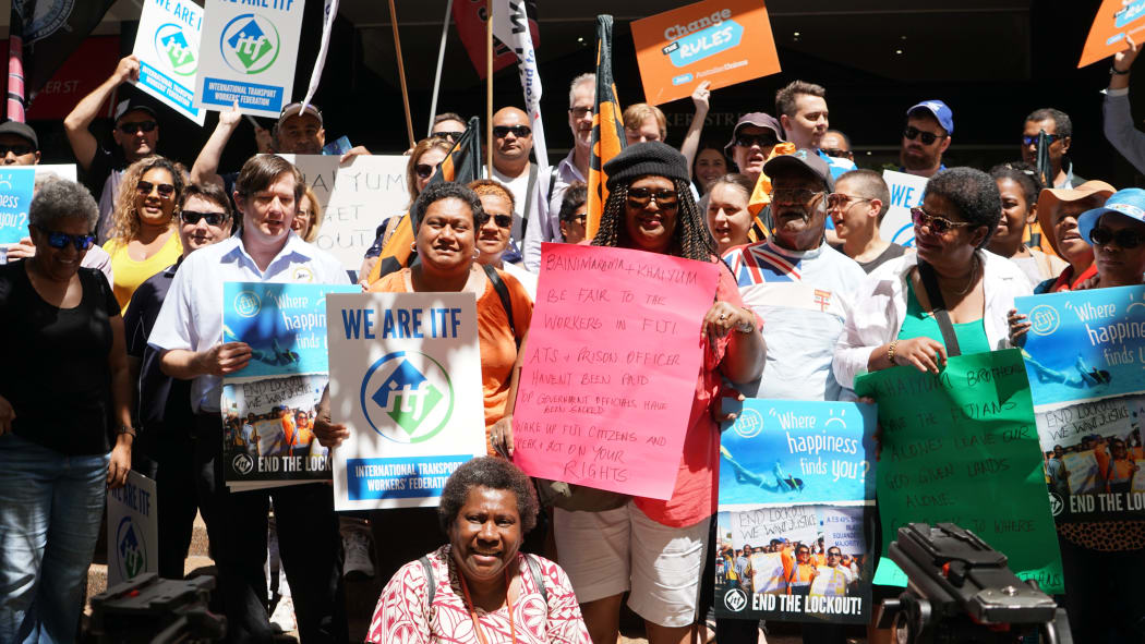 Australian unionists protesting outside Fiji's consulate in Sydney in support of Fijian airport workers.