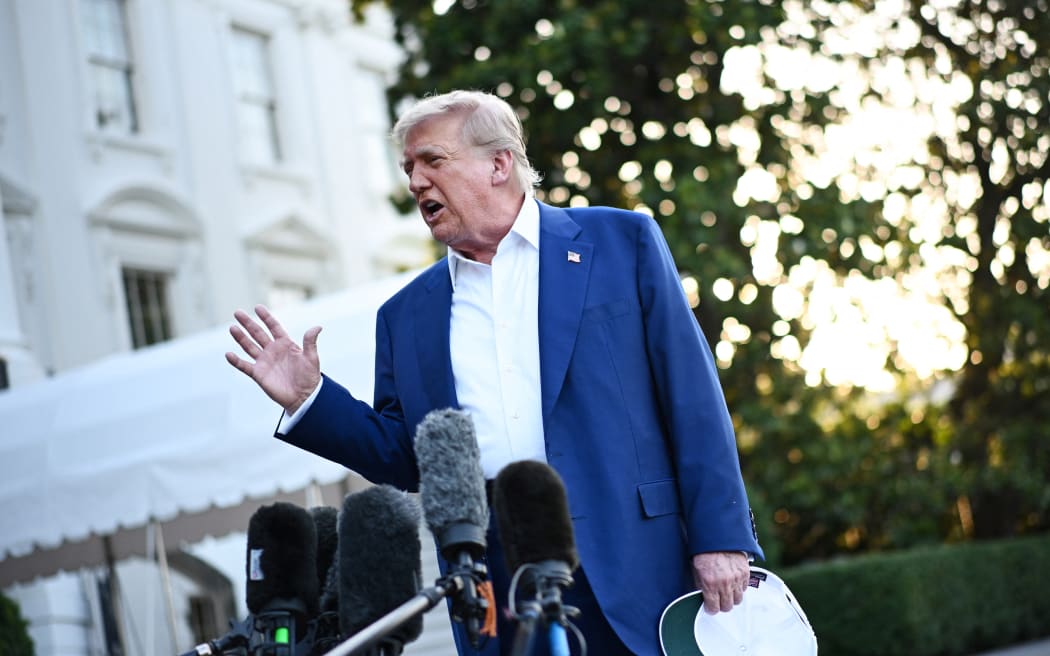 US President Donald Trump speaks to the press before boarding Marine One from the South Lawn of the White House in Washington, DC on June 24, 2025, to attend the NATO's Heads of State and Government summit in The Hague.