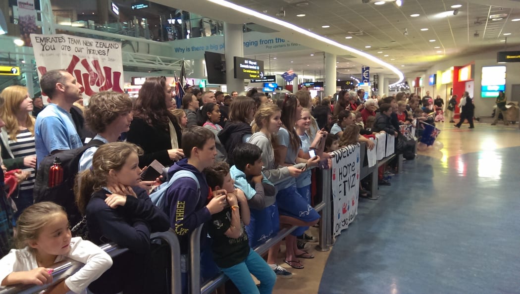 Fans at Auckland airport on Monday morning.