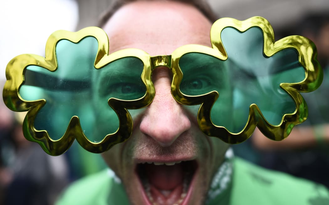 Irish fan watching the world through emerald-tinted glasses.