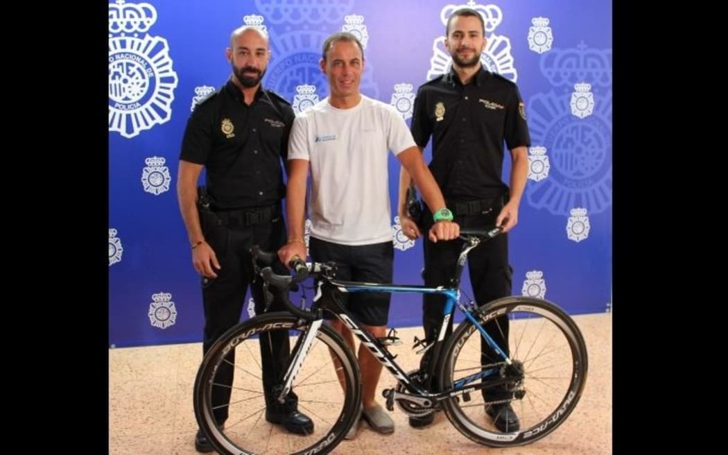 Local police with the specialist bike that was found in a second-hand store.