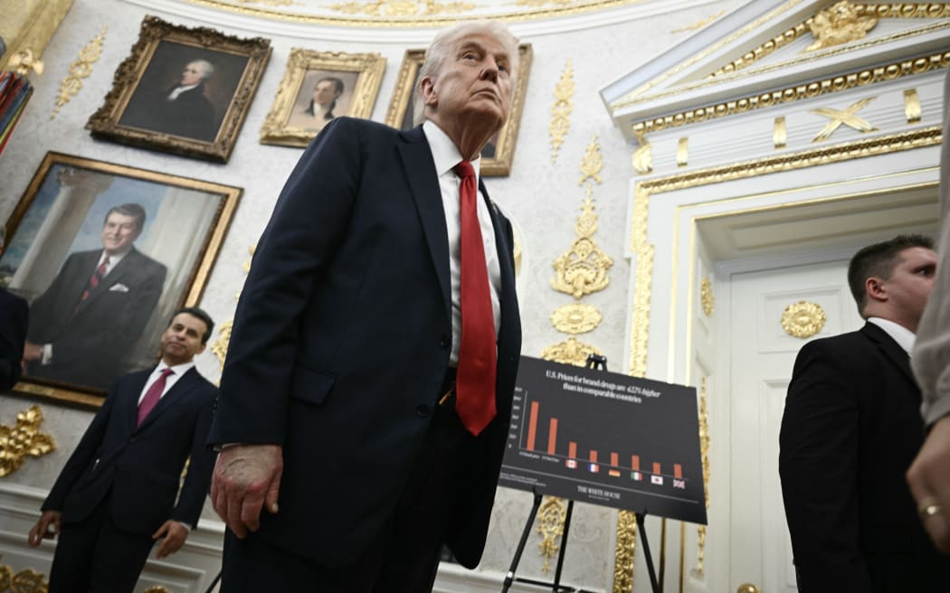 US President Donald Trump departs after making an announcement on prescription drugs in the Oval Office of the White House in Washington, DC, on September 30, 2025. Trump on Tuesday announced a deal with the pharmaceutical giant Pfizer that he said would lower certain drug prices in the United States, without providing specifics. The US president, flanked by top officials, was scant on details but indicated the deal involves granting the company a three-year reprieve on planned pharmaceutical tariffs. The announcement saw Pfizer's stock price rise by five percent. (Photo by Brendan SMIALOWSKI / AFP)