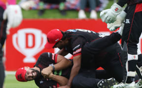 Canterbury Kings's Daryl Mitchell celebrates catching Katene Clarke from the Northern Brave during the Super Smash men's elimination final at the Basin Reserve in Wellington, 1 Feb, 2025.