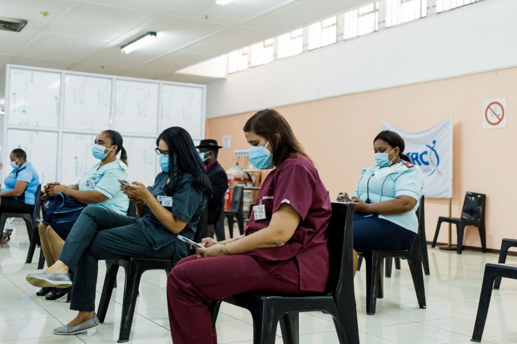Healthcare workers await to receive a dose of the Johnson & Johnson vaccine against the COVID-19 coronavirus as South Africa proceeds with its inoculation campaign at the Prince Mshiyeni Hospital in Umlazi, south of Durban on February 18, 2021.
