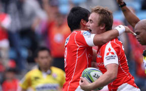 The Sunwolves' Hayden Parker is congratulated.