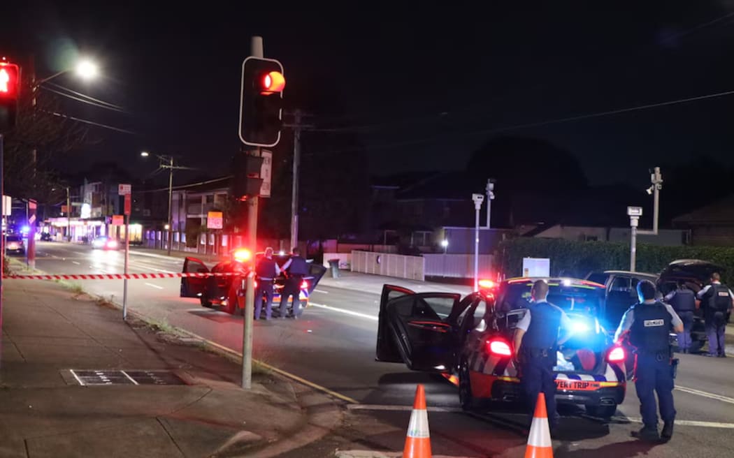 Police cars line the street in Sydney's Croydon Park as the shooting unfolded on Sunday 5 October 2025