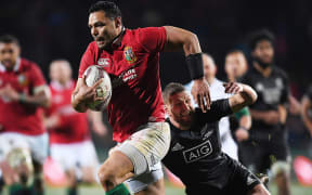 Ben Te'o makes a break for the Lions.