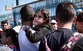 Syrian refugees in transit in Greece.