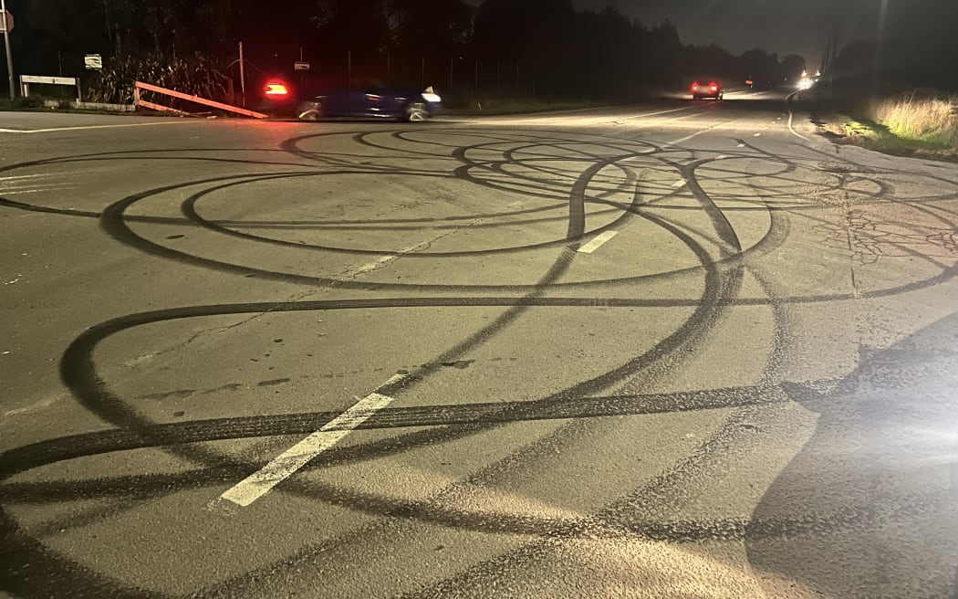 Burnouts left on a Canterbury road after a skid meet.