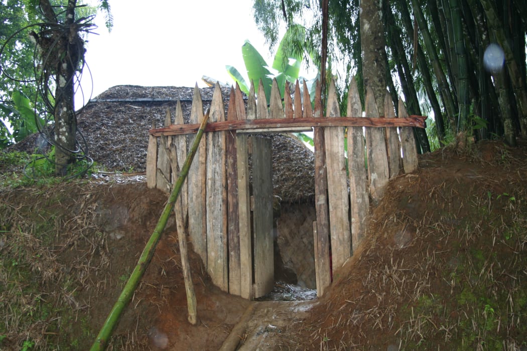 The spectre of tribal fighting is a constant in Papua New Guinea's Hela province where villages are typically protected by trenches and tightly guarded gates.