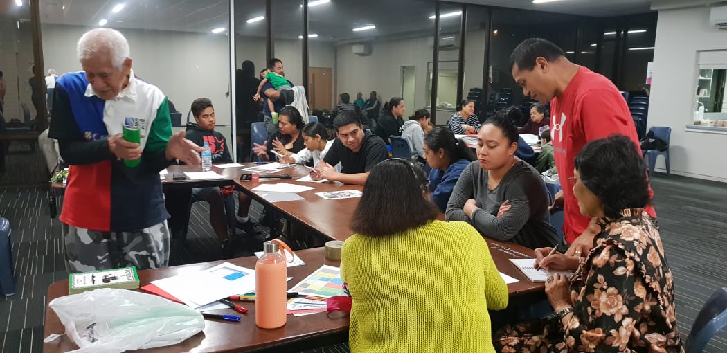 Auckland Rotuman community leader Faga Fasala, standing in the red shirt, and pastor Ravai Mosese, left, with participants at Saturday's language class in Auckland.