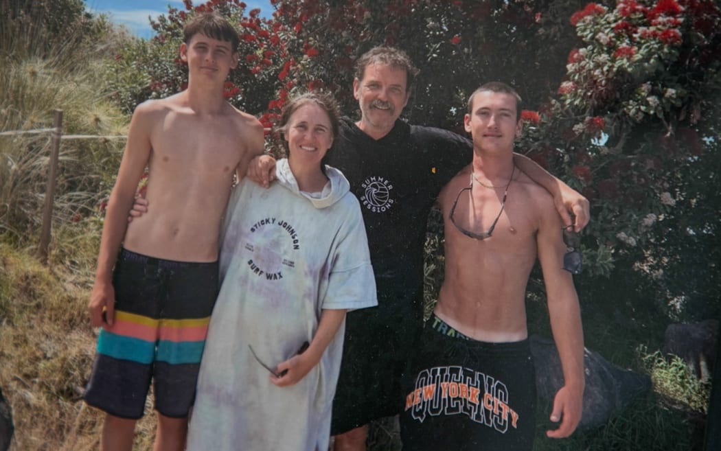 Silas Sims, right, with his family.