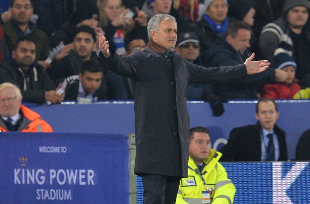 Jose Mourinho gestures during an English Premiere League match.