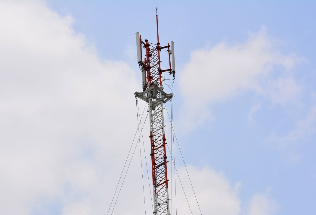 cell phone tower or mobile phone tower on blue sky background