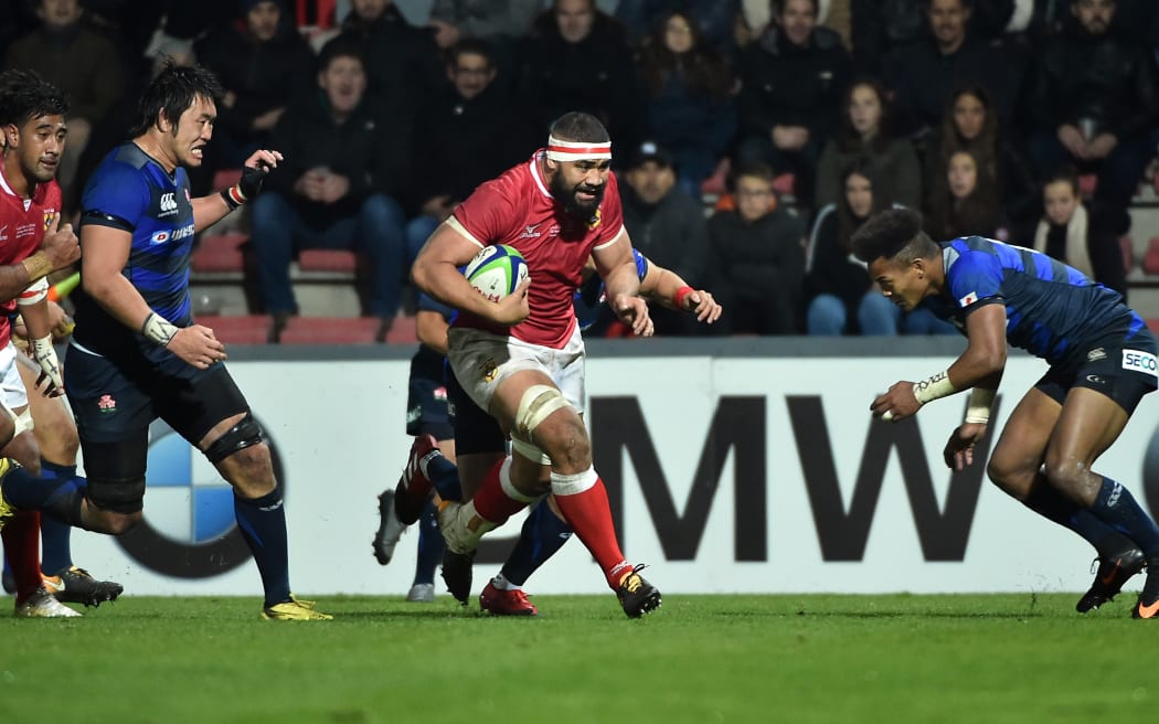 Tonga's number eight Vaipulu Maama on test debut against Japan.