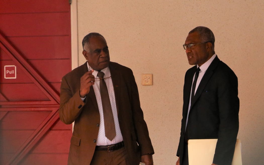 Vanuatu Prime Minister Ishmael Kalsakau and Attorney-General Arnold Kiel Loughman outside the Parliament Building in Port Vila. 22 August 2023