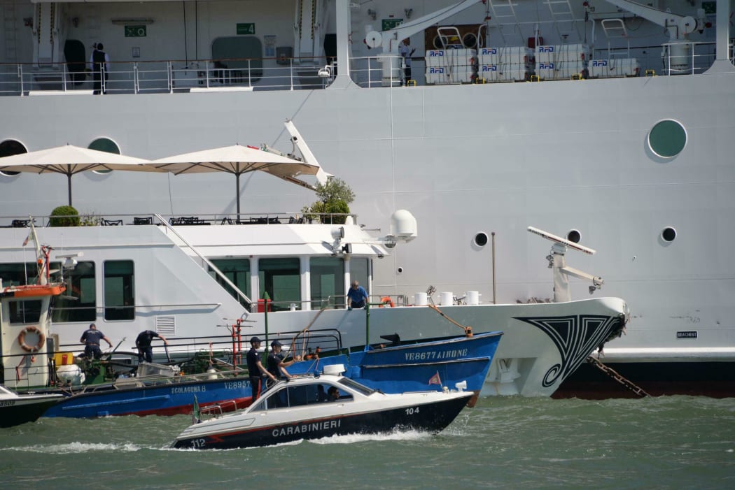 The MSC cruise ship Opera is seen after the collision with a tourist boat, in Venice, Italy, Sunday,  June 2, 2019.