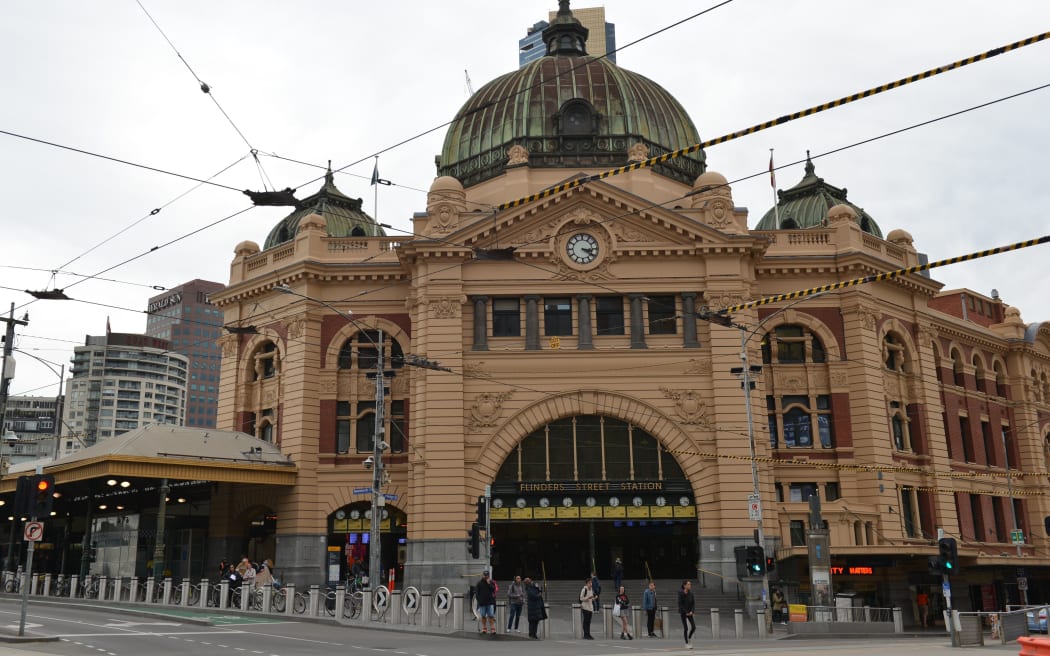 MELBOURNE, AUSTRALIA - APRIL 28: People are seen at the city centre after streets and roads remain nearly empty following a great number of shops are being closed within coronavirus (COVID-19) restrictions in Melbourne, Australia on April 28, 2020.