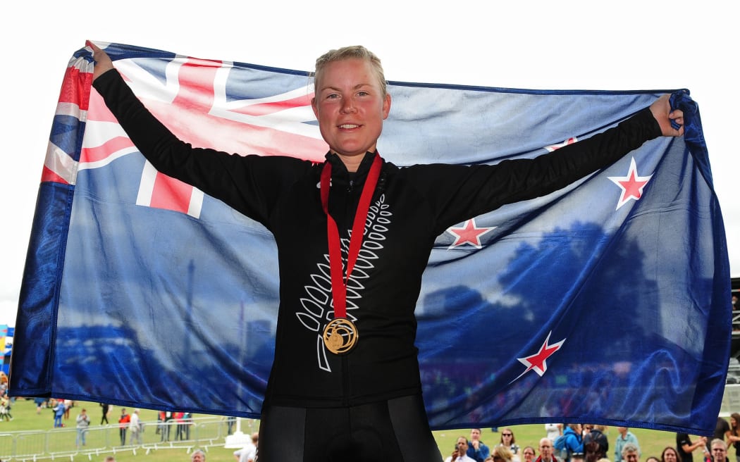 Cyclist Linda Villumsen celebrates gold.