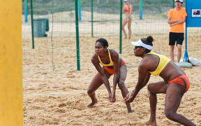 Majabelle Lawac (left) and Sherysyn Toko in action at the Asian Senior Beach Volleyball Championships