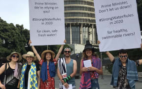 Choose Clean Water don togs and towels in Parliament grounds this morning.