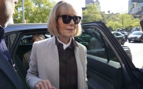 (FILES) In this file photo taken on April 25, 2023 Writer E. Jean Carroll arrives as jury selection is set to begin in the defamation case against former US President Donald Trump brought by Carroll, who accused him of raping her in the 1990s, at the Manhattan Federal Court, New York.