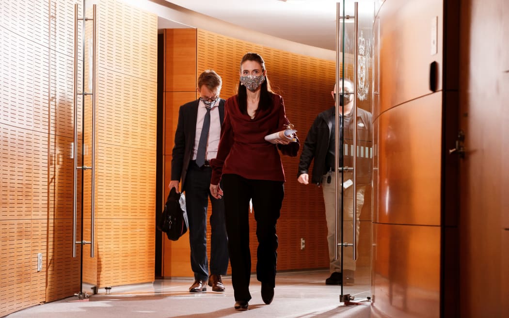 Prime Minister Jacinda Ardern, followed by Director-General of Health Dr Ashley Bloomfield