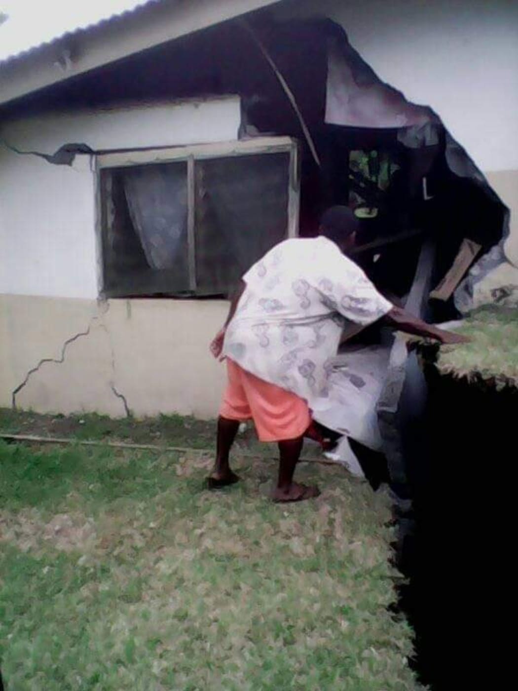 A man outside a house on Ambrym