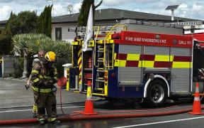 Firefighters at a house fire on Balmain Road in Chatswood.