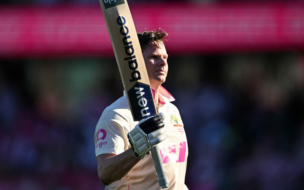 Australia’s Steve Smith acknowledges spectators as he walks off the field at the end of day three of the fifth Ashes cricket Test between Australia and England at the Sydney Cricket Ground in Sydney on January 6, 2026. (Photo by Saeed KHAN / AFP) / --IMAGE RESTRICTED TO EDITORIAL USE - STRICTLY NO COMMERCIAL USE--