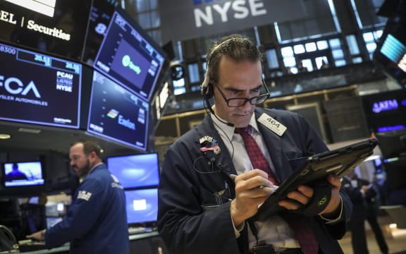 Traders at the New York Stock Exchange.