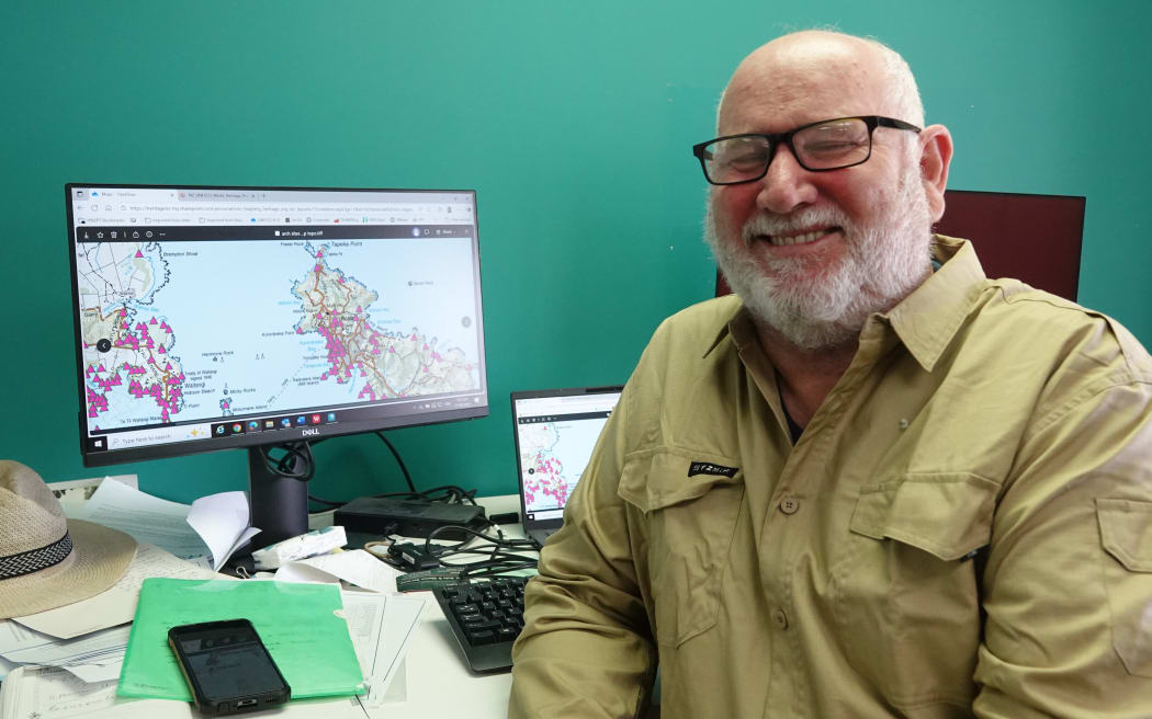Heritage New Zealand Northland manager Bill Edwards with a map of archaeological sites around Kororāreka-Russell.
