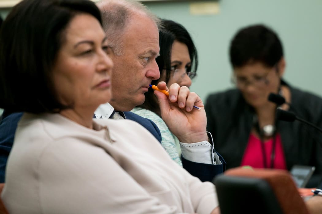National MPs Hekia Parata (left), Jono Naylor (right), and Parmjeet Parmar listen to the Ministry for Vulnerable Children, Oranga Tamariki give evidence to the Justice and Electoral Committee.